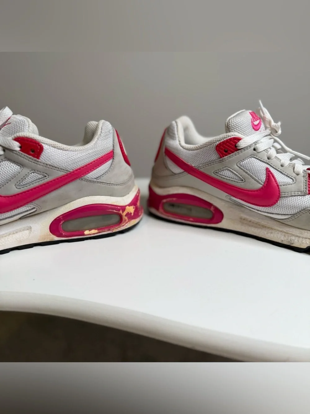Nike Women's White Sneakers with Hot Pink Accents